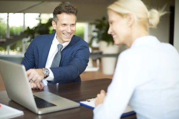 Consultant meeting with a business owner