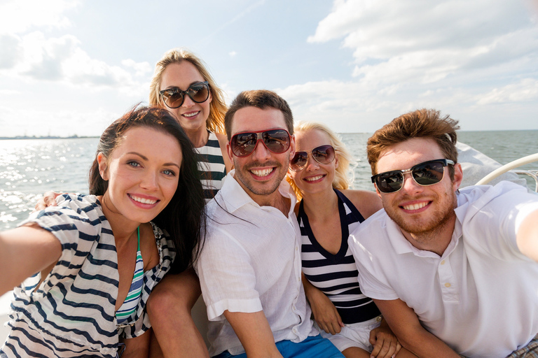 Happy tourists on a boat excursion