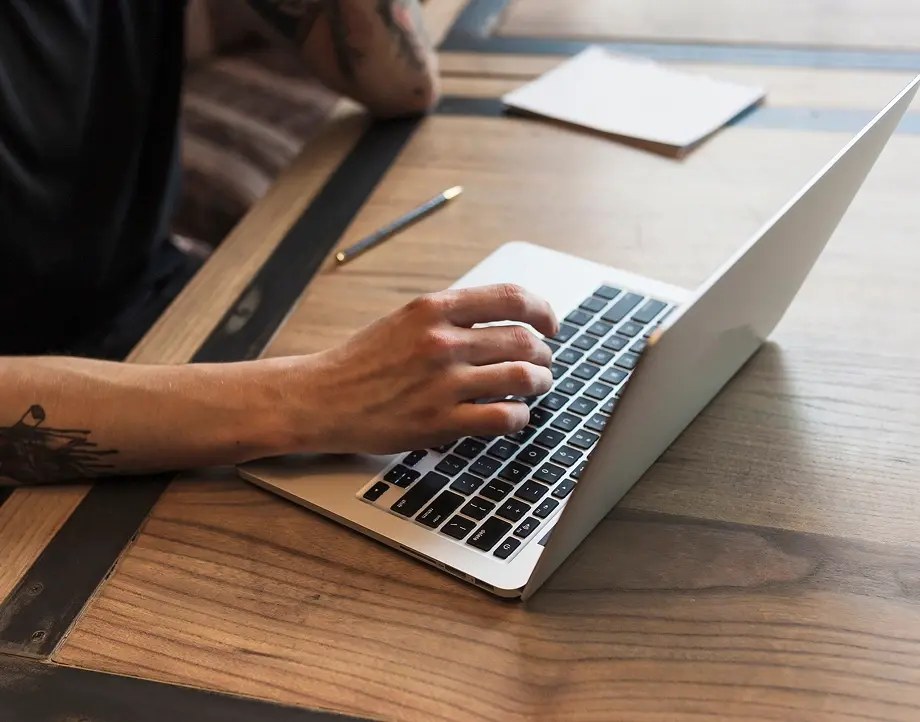 Web designer working on a laptop